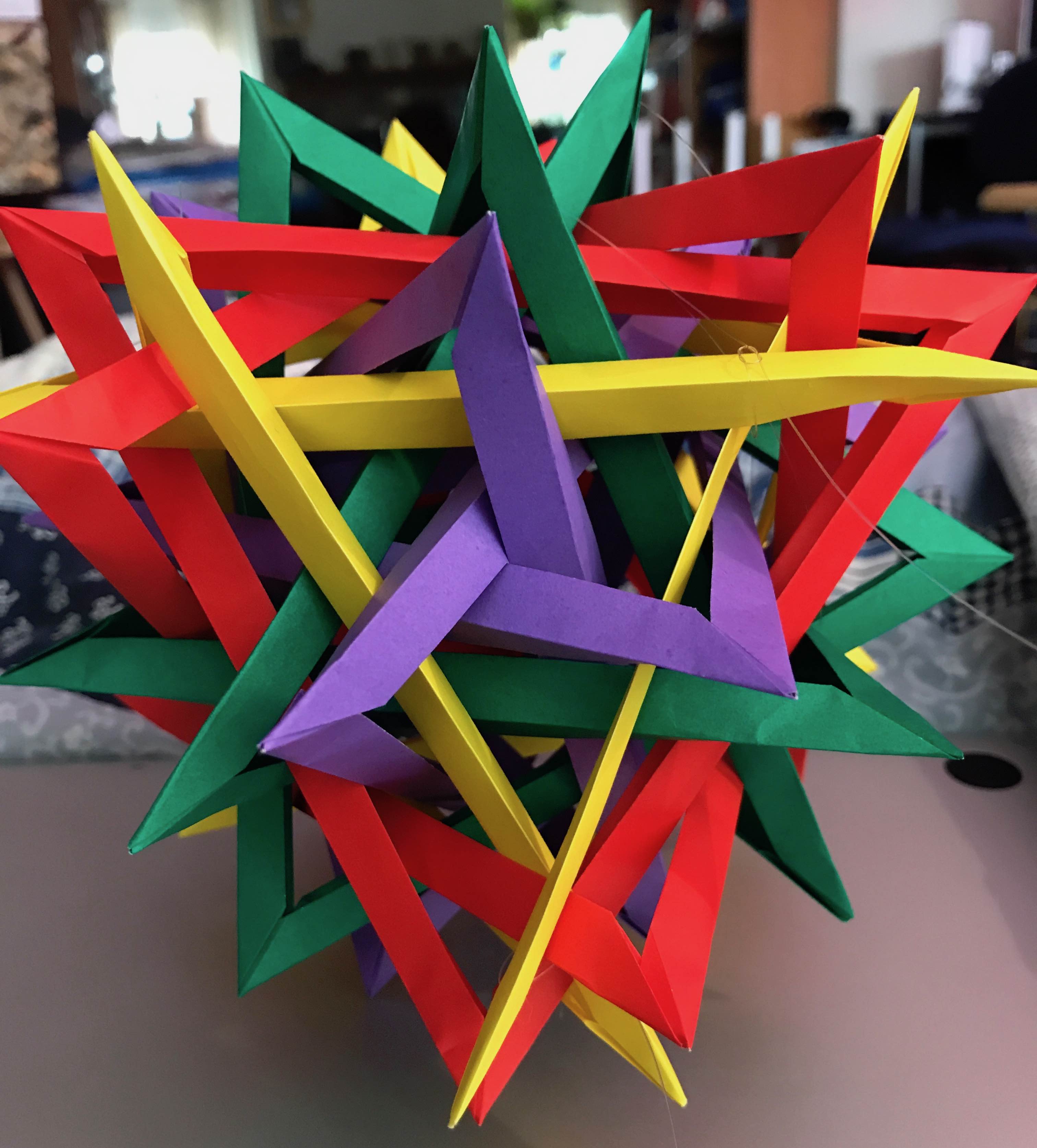 Finished sixteen triangles, with yellow/red centered